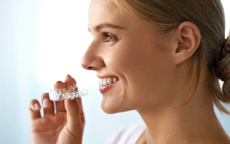 Smily Girl with clear aligners